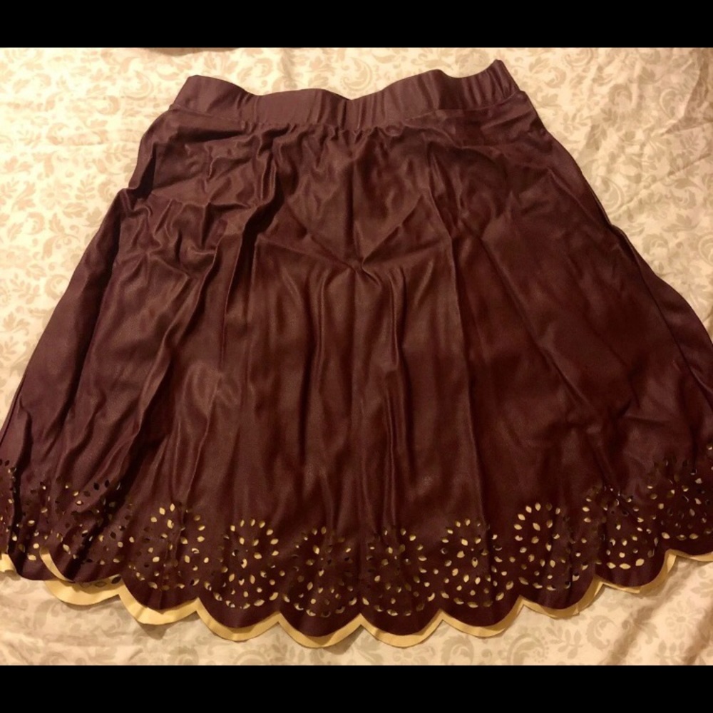 Faux leather skirt with details